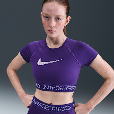 Nike Pro Women's Dri-FIT Short-Sleeve Cropped Graphic Top. Nike LU